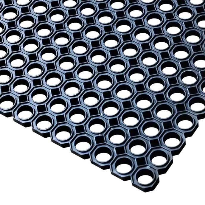 Close-up of a black honeycomb rubber mat