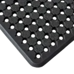 Close-up of black rubber honeycomb drainage mat