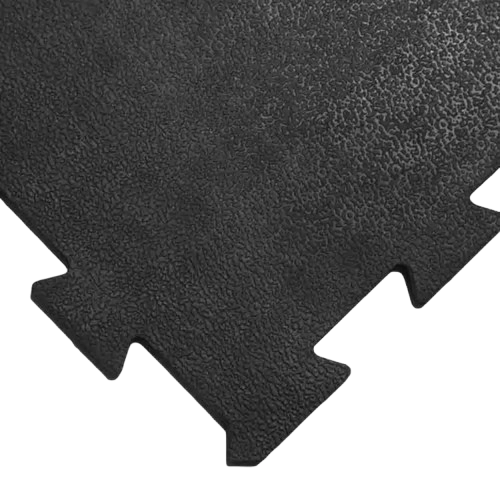 Close-up of black textured foam tile with puzzle edges