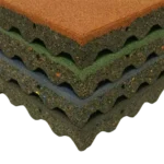 Close-up of textured rubber safety tiles with wavy edges