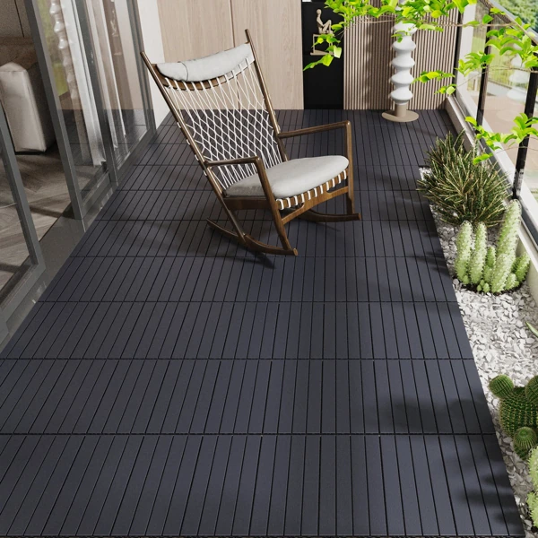 Dark gray slatted deck tiles on a balcony