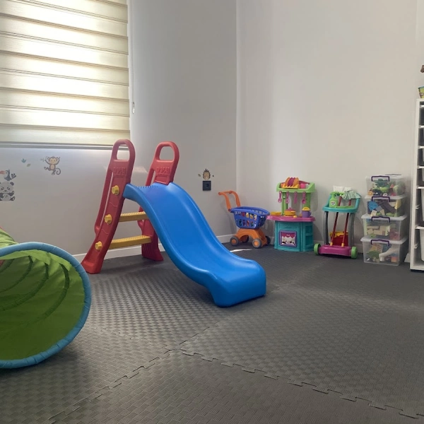 Gray foam puzzle mats in a children's playroom