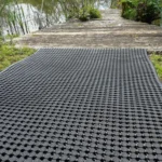Rubber drainage mat used as a walkway to a wooden dock