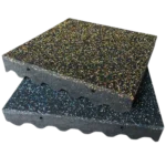 Stacked speckled rubber flooring tiles