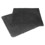 Two interlocking black diamond-plate floor tiles